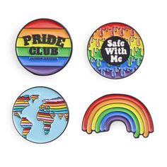 three badges with different colors and designs on them, one has a rainbow in the middle