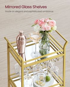 a gold serving cart with drinks and flowers on the top is featured in this ad for mirrored glass shelvings