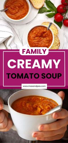 a person holding a bowl of creamy tomato soup in front of some bread and tomatoes