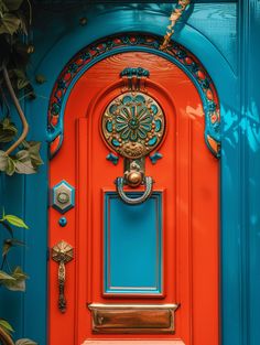 an orange and blue door with a clock on it