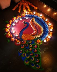 the peacock is decorated with candles and flowers