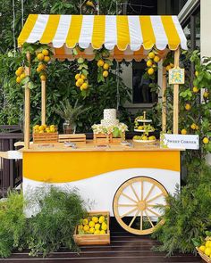 a yellow and white cart with lemons on it