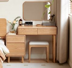 a bedroom scene with focus on the dresser and mirror