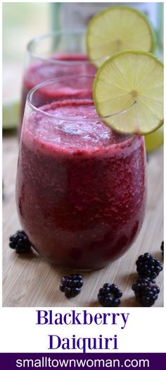 blackberry daiquita smoothie in glasses with lime and blackberries on the side