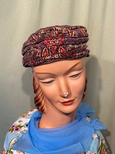 This is a sweet, vintage hat from the 40s or early 50s. Labeled Hats by Concetta.  No size tags. It measures 20-1/2" around the inside. It is made of a paisley print velvet in shades of red, blue, brown & green. It is a turban style hat that cups the head.  The hat is in good, vintage condition.   No damage or issues. No soil on the outside of the hat, but the inside sweatband shows some fading & light staining. Charming! Velvet Turban, Turban Hat, Turban Style, Stretch Velvet, Derby Hats, Copper Color, Black Wool, Baby Bows, Shades Of Red