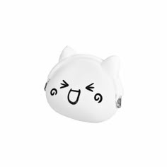 a white cat coin purse with black eyes and nose drawn on it's face