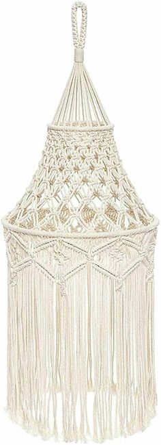 a white hanging lamp with fringes on it