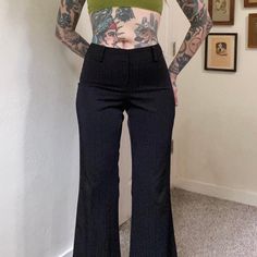 The brand is Modern Essentials Juniors. Size material portion of tag is completely faded. 94% spandex 6% polyester. Has wide belt loops. Has a couple lil pulled threads on thighs that aren't super noticeable at all imo but are in otherwise good overall condition. Seen on a 5'5"1/2, 26" waist & 38" hip. Measurements taken flat then stretched taut. Take low rise into account when comparing measurements to determine if these will fit you.  Waist: 14" flat up to 17" (28"-34") Rise: 9.75" Hips: 20" f Fitted Striped Bottoms With Belt Loops, Fitted Hip-length Bottoms For Work, Fitted Pinstripe Pants For Spring, Retro Fitted Black Bottoms, Black Fitted Retro Bottoms, Fitted Pinstripe Bottoms For Spring, Y2k Fitted Bottoms With Belt Loops, Fitted Striped Straight Leg Dress Pants, Fitted High Waist Striped Bottoms