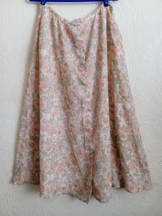 Sweet pastel floral skirt by Liz Claiborne Studio S design.size 12. Button down front. 100% polyester. Fully lined. Fabric has a nylon/ chiffon type feel. Top layer semi sheer over solid white lining. Very feminine, romantic, cute white buttons down entire front. Very good condition. Pastel Skirts, Feminine Romantic, S Design, White Button Down, Pastel Floral, Studio S, Liz Claiborne, Dream Wardrobe, Floral Skirt