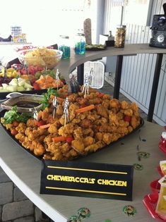 a buffet table filled with different types of food and condiments on top of it