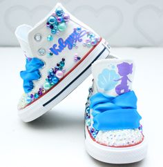 How adorable are these Mermaid inspired converse! The perfect shoe to complete the look! Please leave your name needed in the notebox during checkout Visit the tutu section or search bar for the matching outfit! If you are unsure of sizing please scroll to the last photos for our size charts, or visit our size charts here--> https://pinktoesnhairbows.com/pages/size-chart All sales are FINAL, Ship dates can be found directly on the listing, please view our policies in detail here---> https://pinktoesnhairbows.com/pages/policies-terms-conditions Mermaid Costume Shoes, Mermaid Sandals, Candyland Custom Shoes, Ariel Shoes Women, Mermaid Converse, Mermaid Shoes, Overalls Boys, Tutu Dress Costumes, Bling Converse