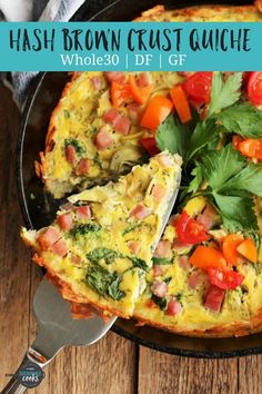 an omelet with vegetables is shown in a skillet