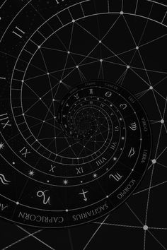 an astro wheel is shown in black and white with the zodiac signs on it's side