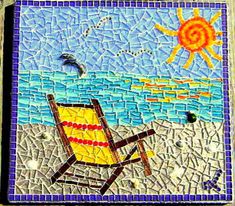 a mosaic on the side of a building with a beach chair