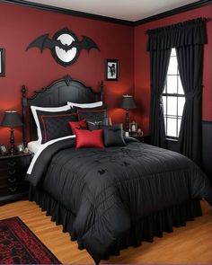 a bedroom with red walls and black bedding