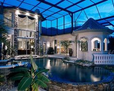 a house with a pool inside of it