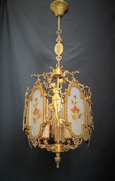 an ornate chandelier hanging from the ceiling