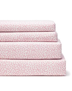 three sheets are stacked on top of each other, with hearts in pink and white