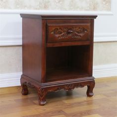 International Caravan - End Tables - 3893ST - Enhance the smallest corners of your home or bedroom with the Windsor hand-carved night stand/hall table by International Caravan Home Furnishings. This table is made of firm hardwood with a rich dark walnut stain finish and features ornate carvings, making this an ideal accent piece to an overlooked section of any room. Pair it with a beautiful antique lamp, or use it as a book rest for long reading sessions by the fireplace.Enhance your home decor with this round hardwood indoor end table.; Furniture is made of sturdy hardwood with a luxurious finish and elegant carvings.; Designed in a premium dual walnut stain finish.; Comes with (1) easy sliding drawer for extra storage.. Specifications:Frame Material: Hardwood; Frame Color: Walnut. Caravan Home, Book Rest, New Room Decor, Stained Table, Drawer Table, Antique Lamp, International Market, Small Basket, Dark Walnut Stain