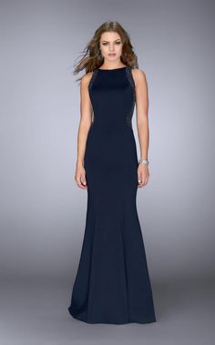 Be a perfect beauty when you walk in figure flattering Prom Dress by La Femme 24839. This elegant neoprene gown features sheer beaded sides and a covered back. The gorgeous floor length svelte skirt drops in a classy and fabulous flares with a romantic train. This La Femme is truly a definition of sophistication and classic look that works for many special occasions. Style: lafemme_24839 Closure: Zipper Details: Sleeveless, Fitted bodice, Crystal beaded sheer back and side bodice Fabric: Neopren Neoprene Gown, Slavic Style, Navy Blue Prom Dress, Navy Blue Prom, Navy Prom Dresses, Mother Of The Bride Dresses Long, Military Ball Dresses, Modest Prom