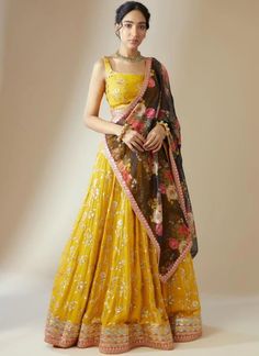 Introducing our collection of Indian ensembles, designed for every memorable moment. Explore our offerings, including attire for the joyful Haldi ceremony, graceful Bridesmaids' Lehenga Choli, intricate Mehendi ensembles, enchanting Engagement Ceremony Lehenga Choli, rhythmic Sangeet Ceremony Lehenga Choli, traditional Tilak/Sagan Ceremony outfits, radiant Haldi Ceremony Lehenga Choli, sophisticated Reception Lehenga Choli, heartfelt Blessing Ceremony ensembles, and opulent Indian wedding attire Yellow Cutdana Choli For Festivals, Yellow Choli With Cutdana For Festivals, Yellow Cutdana Lehenga For Eid, Yellow Sharara With Unstitched Blouse For Navratri, Eid Yellow Lehenga With Cutdana Details, Yellow Floor-length Salwar Kameez With Sheer Dupatta, Yellow Floor-length Georgette Saree, Yellow Sharara With Unstitched Blouse For Festivals, Yellow Bollywood Choli With Cutdana Details