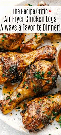 grilled chicken legs on a plate with dipping sauce