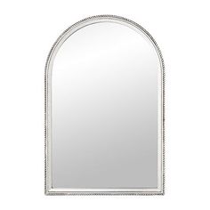 an arched mirror on a white background