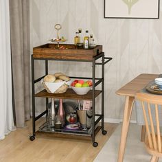 a kitchen cart with food and drinks on it