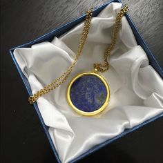 Brand New. A Gorgeous Genuine Lapis Lazuli Pendant/Necklace Set In Goldtone And Ion Plated Yellow Gold Stainless Steel. 24 Inch With A Lobster Clasp. Stricking! Pendant Decked With A 1 - 1/2 Inch Round Disc Lapis Goldflakes Stone, Giving It A Very Spectacular Look, No Matter What You Decide To Wear It With.! Being A Natural Stone, With It's Authentic Unique Coveted Shades No Two Would Ever Look The Same, Adding Special Attention To It. Durable. Non Allergenic Metal. Opera Length. Makes The Perfe Blue Jewelry With Detachable Round Pendant, Blue Jewelry With Detachable Pendant, Luxury Blue Locket Necklace, Blue Necklace With Detachable Round Pendant, Blue Medallion Locket Necklace As Gift, Lapis Lazuli Round Pendant Jewelry Gift, Lapis Lazuli Round Pendant Jewelry For Gift, Lapis Lazuli Pendant Necklace For Gift, Blue Medallion Locket Necklace