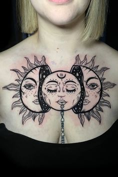 a woman with sun and moon tattoos on her chest