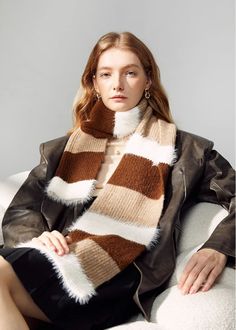 Stay warm and stylish this winter with our brown colorblock long scarf. Made from a soft wool blend, this scarf is perfect for women looking to make a statement while braving the cold. With its versatile color and long length, it's a must-have accessory for the season. 70" x 11" /180cm x 28cm 60% acrylic, 29% polyester, 7% wool, 4% spandex Hand wash, dry flat Item #492423 Warm Acrylic Scarves For Fall, Chic Brown Scarf For Fall, Brown Casual Scarves For Cold Weather, Warm Brown Scarf For Fall, Casual Brown Scarves For Cold Weather, Warm Brown Fall Scarf, Warm Brown Scarves For Cold Weather, Warm Brown Scarf For Cold Weather, Cold Weather Acrylic Scarves