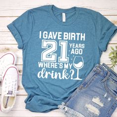 Celebrate your girlfriend's 21st birthday with this fun and witty I Gave Birth 21 Years Ago, Where's My Drink? shirt! Perfect for moms who deserve a drink after 21 years of hard work. This trendy 2003-themed shirt makes a great gift for a 21st birthday party and is sure to be a hit. Thoughtful, humorous, and stylish We specialize in creating unique, custom-designed apparel for everyone, using high-quality DTF (Direct-to-Film) printing on a variety of products. Our selection includes unisex t-shirts, sweatshirts, hoodies, women's tank tops, toddler t-shirts, youth t-shirts, onesies, and women's v-neck shirts. With our diverse range of items and top-notch printing, we're confident you'll find the perfect piece for yourself or as a gift for someone special. If you have any questions or need h 21st Birthday Shirt, 21st Birthday Shirts, 21st Birthday Party, Birthday Party 21, 21st Birthday Gifts, Film Prints, Drinking Shirts, Birthday Shirt, 21st Birthday