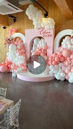 balloons are arranged in the shape of letters and numbers on display at a birthday party