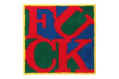 a colorful rug with the word flickk on it in red, green, blue and yellow