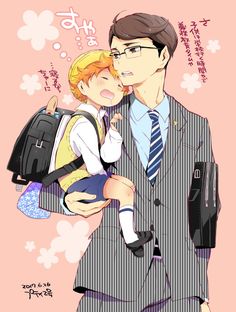 a man in a suit and tie holding a small child on his lap while wearing glasses