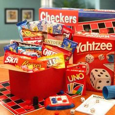 an assortment of games and snacks on a table