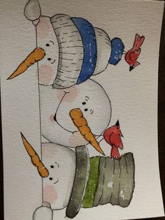 a snowman with two carrots and a bird