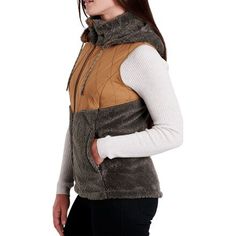 When the temps are chilly, we zip up the Prima Flight Vest from KUHL for premium warmth and soft, active comfort. This top-tier vest blends midweight Italian fleece with nylon taffeta overlays at the chest and shoulders to boost water-resistance and durability where we need it most. Plus, we appreciate the plush collar and removable hood offering us versatility to adapt with changing conditions. Winter Outdoor Vest With Fleece Lining, Nylon Vest For Layering In Fall, Fall Nylon Vest For Layering, Fall Layering Nylon Vest, Functional Midweight Winter Vest, Winter Vest With Fleece Lining For Outdoor Activities, Sleeveless Outerwear With Fleece Lining For Hiking, Outdoor Fall Vest With Fleece Lining, Functional Vest For Layering In Fall