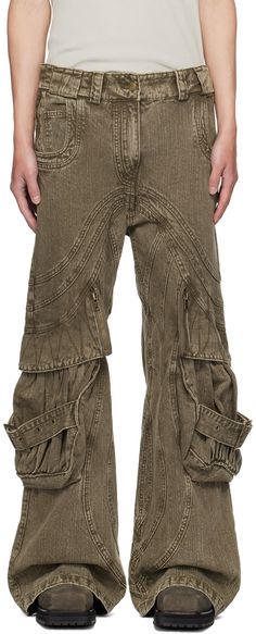 Loose-fit wide-leg non-stretch denim cargo pants. Fading throughout. · Paneled construction · Belt loops · Seven-pocket styling · Zip-fly · Zip pocket at legs · Gathering and pin-buckle strap at bellows pockets · Extended cuffs · Logo embroidered at back waistband · Logo-engraved antiqued gold-tone hardware Supplier color: Grey/Khaki Cool Mens Pants, Khaki Cargo Jeans With Multiple Pockets For Streetwear, Streetwear Khaki Cargo Jeans With Patch Pockets, Khaki Techwear Cargo Jeans With Pockets, No Faith Studios, Wasteland Fashion, Streetwear Rigid Denim Cargo Pants, Khaki Military Cargo Jeans With Flap Pockets, Entire Studios