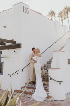 off-the-shoulder, long sleeved lace wedding gown, tan suit, Old Hansen Beach Club, San Clemente wedding, Spanish stairs, California wedding Ole Hanson Wedding, Ole Hanson Beach Club Wedding, Ole Hanson Beach Club, Bridal Appointment, Bride Groom Photos