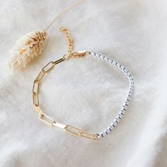 This simple and chunky gold chain Bracelet is must have trendy and versatile for summer. It's a great piece to wear on its own or to layer with your favorite bracelet. -----------------------♡-------------------- D E T A I L S: * 4 Different Colors -----------------------♡-------------------- M A T E R I A L S: * 18k Gold Filled Chain -----------------------♡-------------------- H O W T O O R D E R 1.) Choose the Option (4 Different Colors) in the drop down menu 2.) Choose the Options (Length) i Minimalist White Jubilee Chain Bracelet, Adjustable 14k Gold-filled Chain Bracelet, Adjustable 14k Gold Filled Chain Bracelet, Adjustable 14k Gold-filled Paperclip Chain Bracelet, White Link Chain Bracelets, White Dainty Adjustable Chain Bracelet, Dainty White Adjustable Chain Bracelet, Adjustable Gold Chain Paperclip Bracelet, White Gold Plated Adjustable Chain Bracelet