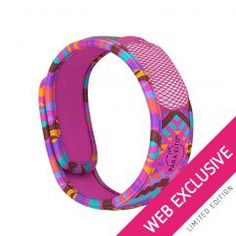 a pink wristband with colorful designs on it and the words web exclusively written below