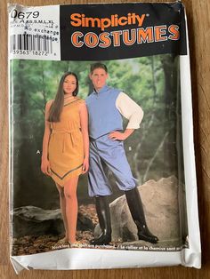 a magazine with an image of two people in costumes on the front and back cover