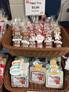 baskets filled with lots of different types of items on display in front of a sign that says night try $ 10 00