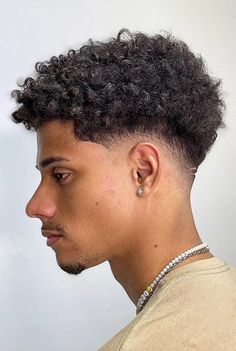 The low fade is a very modern and stylish haircut for men. Before you decide, be sure to take a look at our best low fade haircuts gallery. Low Shadow Fade, Curly Fade Boys, Low Fade Haircut Mens Curly Hair, Mid Drop Fade Haircut Men, Curly Hair Fades For Men, V Fade Haircut, Mid Taper Fade Haircut Curly, Low Fade Afro, Straight Hair Fade