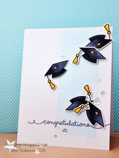 congratulations card with graduation caps and tassels on the top, in blue background