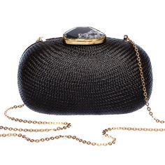 Need an elegant alternative to the usual black satin evening zippered pouch? Turn heads with the Dark Sky oval. The lustrous case is a certain conversation starter once you reveal that it is made of handwoven natural plant fibers in a technique traditionally used for hats. Its crowning glory is the agate stone capped with hand-tooled brass. A brass drop-in chain allows you to carry this beauty on your shoulder or as a clutch under your arm. Fully lined, the compact interior keeps your mobile phone, credit cards, and lipstick ready at hand. - Measurements: 8" width x 2.5" depth x 4.5" height, brass chain strap 19" drop - Body: 100% natural plant fiber, Chain Strap: Brass Chain - Made in the Philippines in our own Larone atelier in collaboration with weavers and artisans From the time my mot Elegant Formal Woven Bags, Elegant Woven Clutch, Elegant Woven Evening Bag, Elegant Woven Clutch For Formal Occasions, Formal Woven Clutch, Woven Clutch Evening Bag, Elegant Woven Clutch For Evening, Elegant Woven Clutch For Party, Elegant Evening Clutch With Woven Details