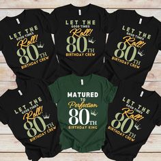 "Celebrate a milestone with our 80th Birthday Shirts - the perfect attire for an unforgettable celebration! Crafted for both comfort and style, these fun 80th party tops feature a timeless design to honor the incredible journey of eight decades. They provide a coordinated and festive look for the entire birthday crew.  Whether you're planning a family gathering or a grand party, these matching 80th shirts add a touch of jubilant spirit to the occasion. Let the world know you're celebrating 80 years of life, laughter, and memories with these special 80th group t-shirts. Cheers to the birthday honoree and the joyous crew gathered to commemorate this remarkable milestone! * 100% combed and ring-spun cotton  * Fabric weight: 4.2 oz/yd² (142 g/m²) * Pre-shrunk fabric * Side-seamed construction; 80 Th Birthday Party Ideas Dad, 80th Birthday Shirt Ideas, 80th Birthday Shirts, 80th Birthday Party Ideas For Dad, 70th Birthday Parties, 80th Birthday Party, 80th Birthday Gifts, 70th Birthday Gifts, 60th Birthday Party