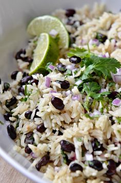 rice with black beans and cilantro in a white bowl