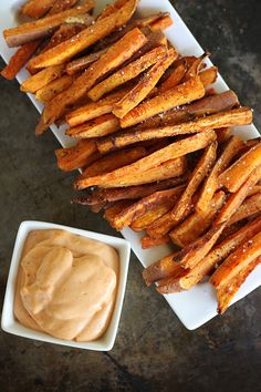 sweet potato wedges with dipping sauce on the side